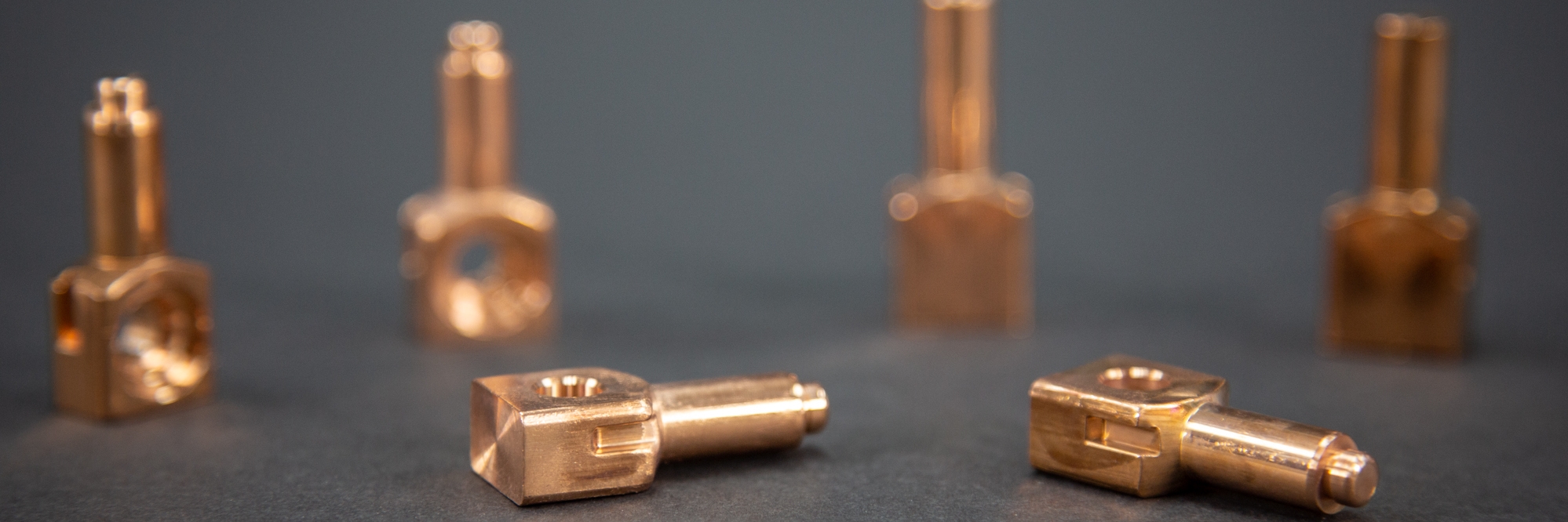 Connector manufacturing using machining processes & cold forming technology